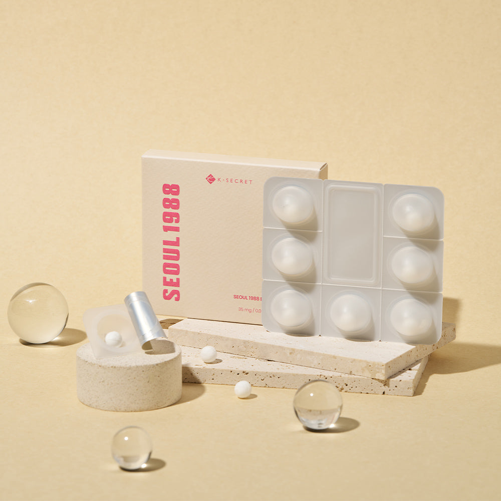 Dissolving process of KSECRET SEOUL 1988 100% Collagen Boosting Ball mixing instantly with a liquid active serum at Atelier De Glow UK.