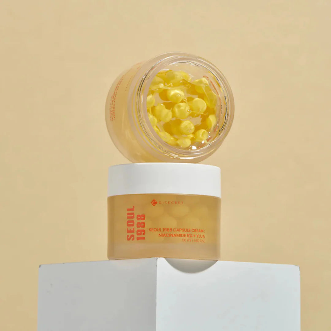Unique dual-texture of KSECRET SEOUL 1988 Cream showing melting vitamin beads suspended in a clear, water-burst gel at Atelier De Glow UK.