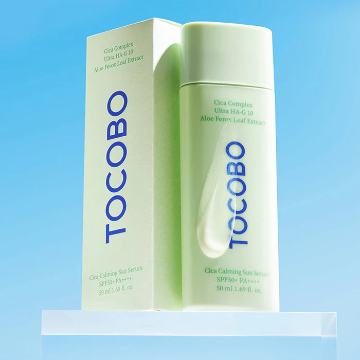 Weightless, watery, and completely translucent serum texture of TOCOBO Cica Sunscreen absorbing instantly without a white cast at Atelier De Glow UK.
