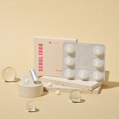 Dissolving process of KSECRET SEOUL 1988 100% Collagen Boosting Ball mixing instantly with a liquid active serum at Atelier De Glow UK.