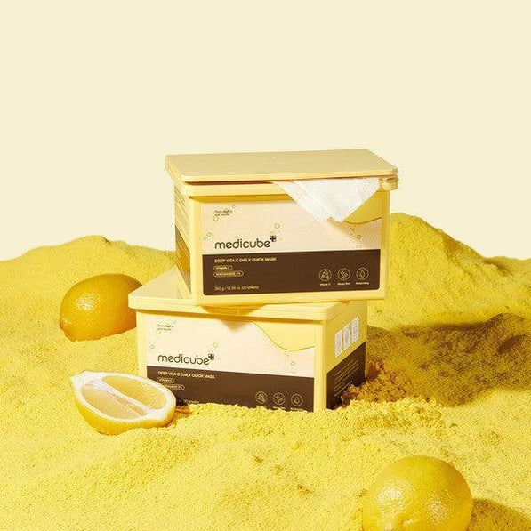 Ultra-thin, completely translucent, and cooling cellulose sheet texture of Medicube Vita C Daily Mask hugging the facial curves at Atelier De Glow UK.