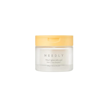 NEEDLY Vita C Glow Jelly Pad 60pcs – brightening facial treatment pads formulated with Vitamin C and hyaluronic acid for radiant, glowing skin available at Atelier De Glow UK.