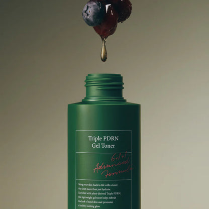 Rich, bouncy, and non-sticky clear gel matrix texture of AXIS-Y Triple PDRN Gel Toner absorbing instantly onto a face canvas at Atelier De Glow UK.