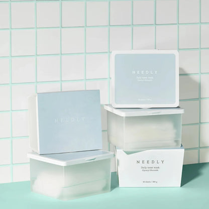 Vegan-certified NEEDLY Daily Toner Mask sheets infused with rich, refreshing essence for a smooth, dewy, and calm complexion from Atelier De Glow UK.