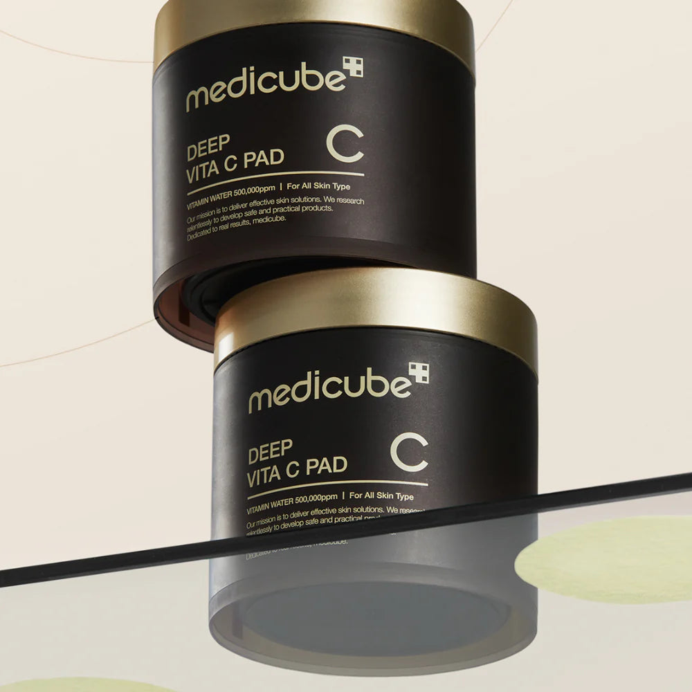 Embossed yellow-tinted texture of medicube Deep Vita C Pad – Dual-action exfoliating and brightening Korean toner pads at Atelier De Glow UK.