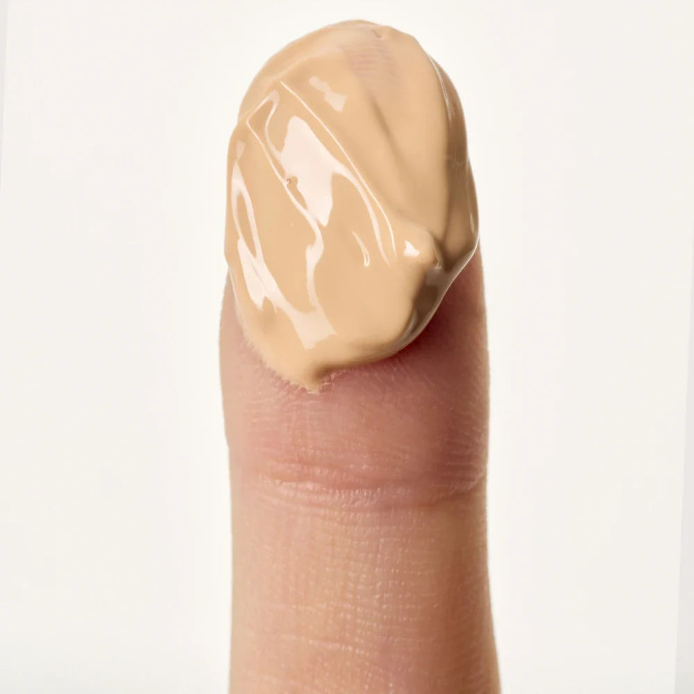Smooth, creamy, and non-greasy banana-tinted fluid texture of shaishaishai Conceal Eye Cream blending transparently into the under-eye area at Atelier De Glow UK.