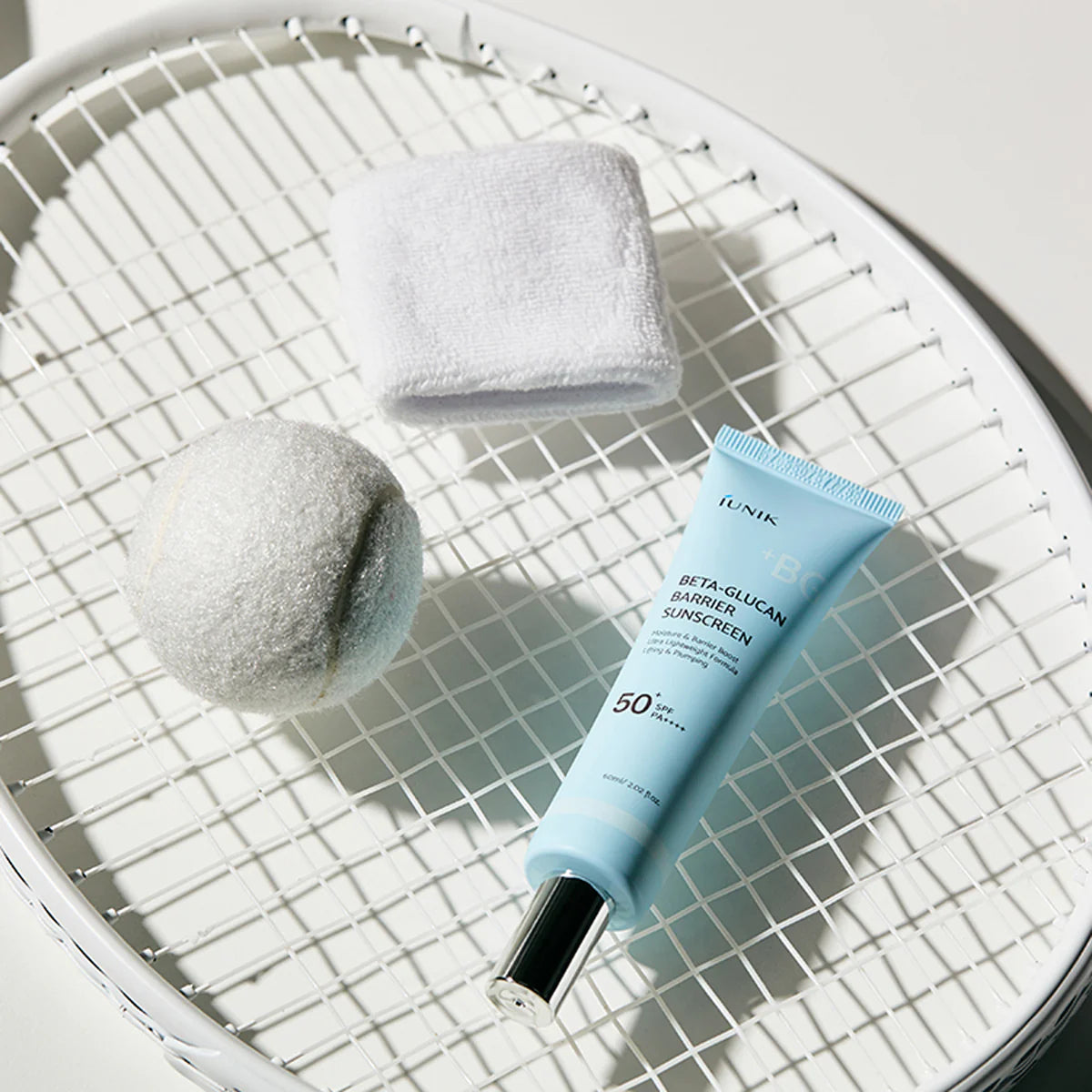 iUNIK Beta-Glucan Sunscreen for preventing fine lines, premature aging, severe environmental dehydration, and white cast chalkiness on sensitive skin – Shield from Atelier De Glow UK.