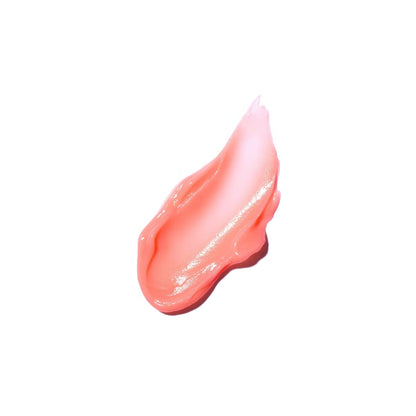 Rich, melting pink balm texture of Laneige Berry Lip Sleeping Mask being scooped with its applicator spatula at Atelier De Glow UK.