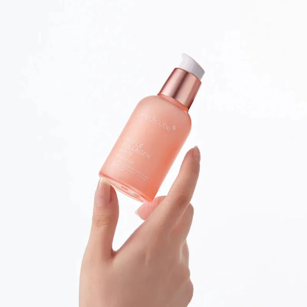 Medicube Triple Collagen Serum for filling deep forehead expression lines, smoothing rough texture flakes, tightening stretched pores, and correcting sallow facial dullness from Atelier De Glow UK.