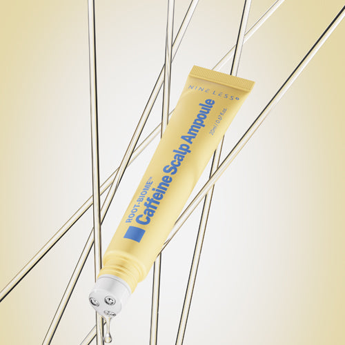 Nineless Root-Biome Caffeine Scalp Ampoule with massage rollerball applicator for hair growth, available at Atelier De Glow UK.